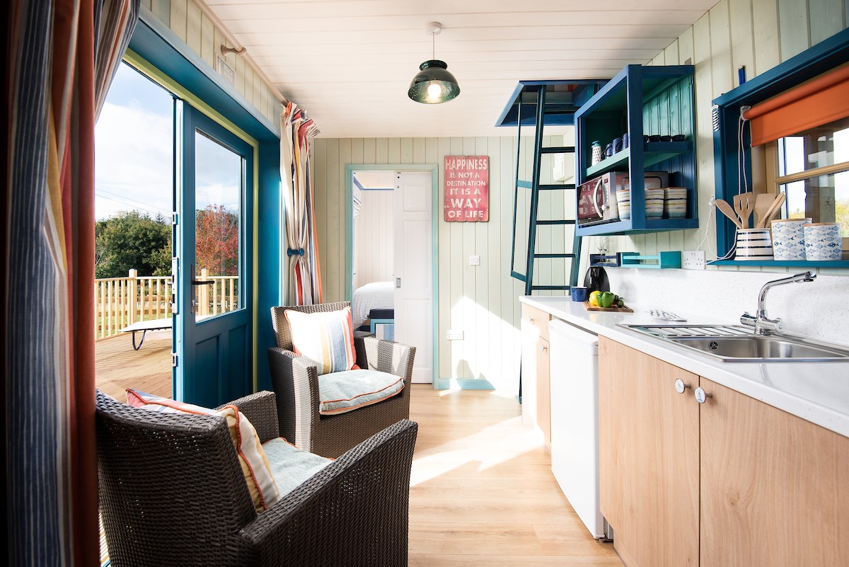Berrington Beach Hut - two armchairs offer the opportunity to take in the view