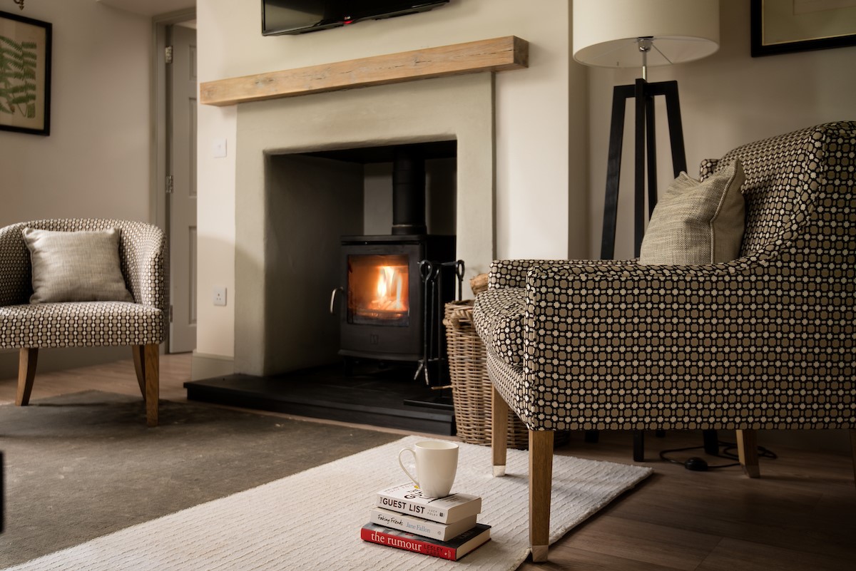 Crailing Coach House - the fireside in the living area