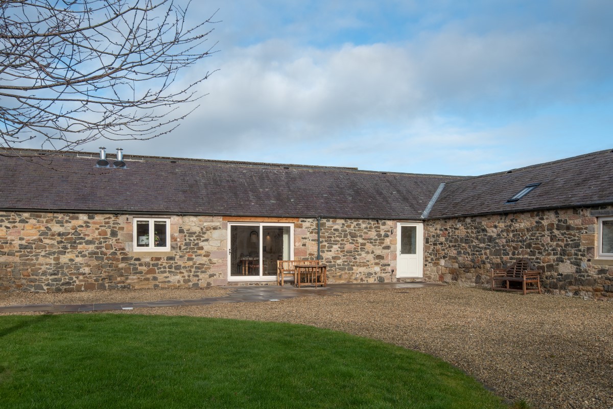 Swallow Dean - external views of the property with patio and shared courtyard