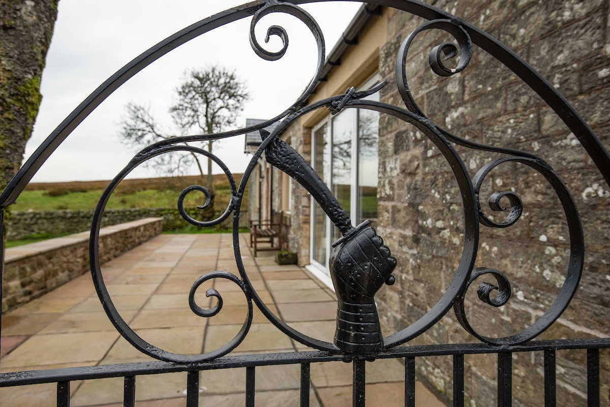 The Bothy at Redheugh - wrought iron gate leading into the front enclosed patio garden
