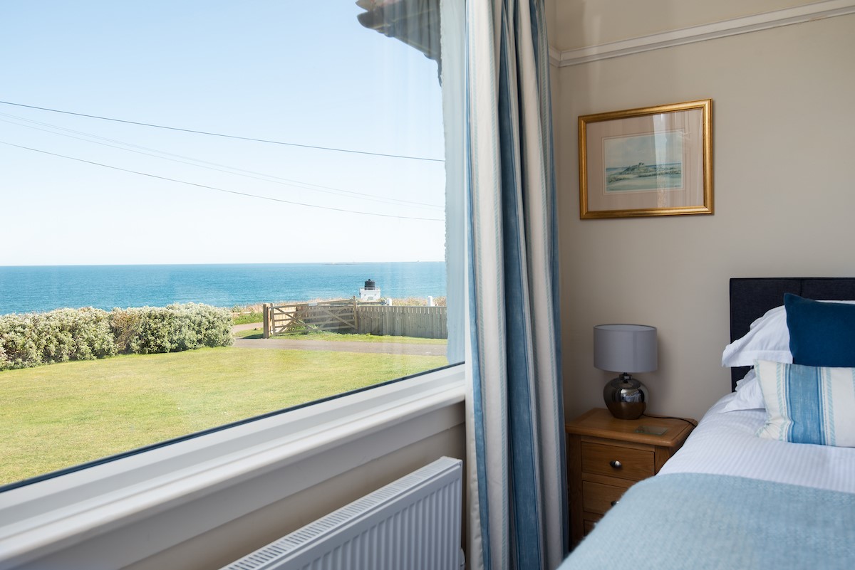 The Fairway - wake up to coastal views from bedroom one