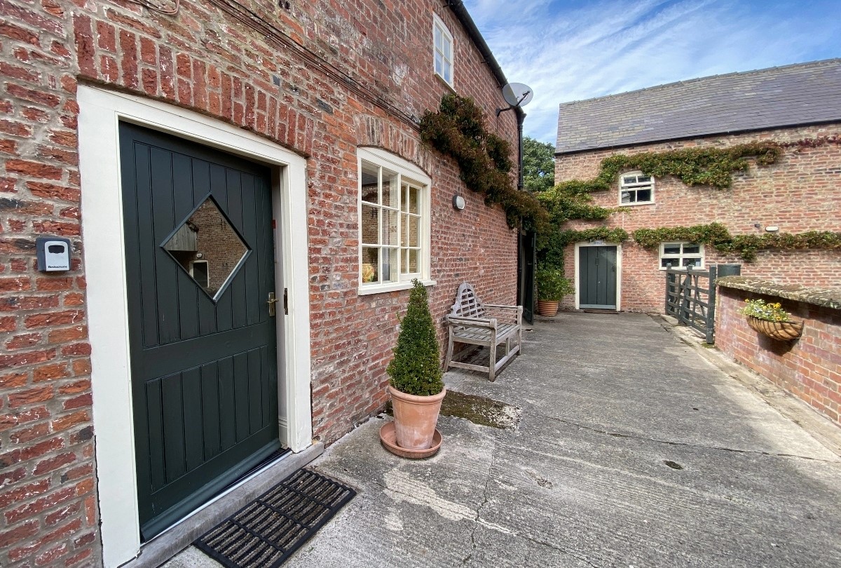Dairy Cottage, Knapton Lodge - the entrance to the cottage from the farm courtyard