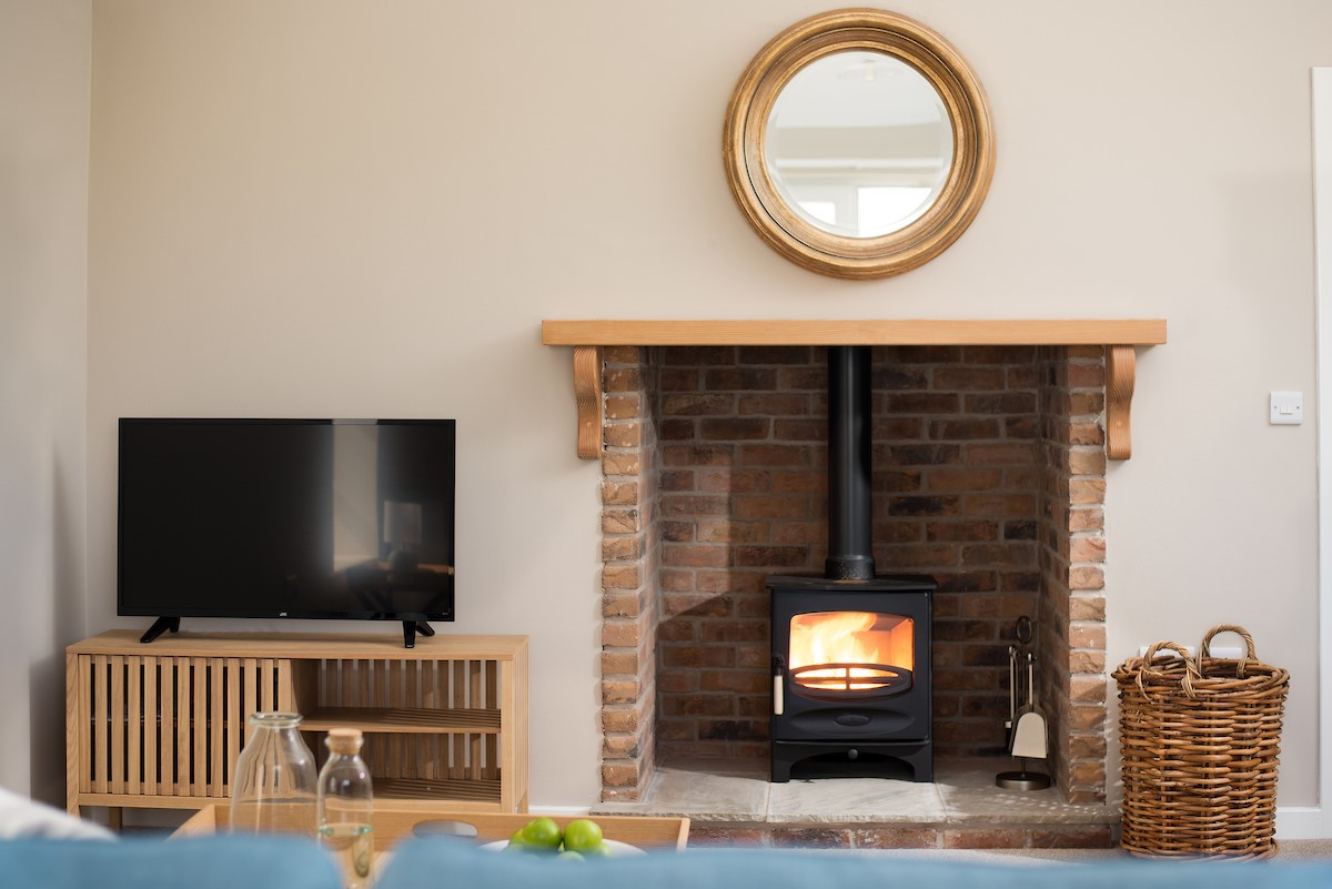 Lyme Grass - cosy wood burning stove, perfect for those autumnal evenings after a day on the beach