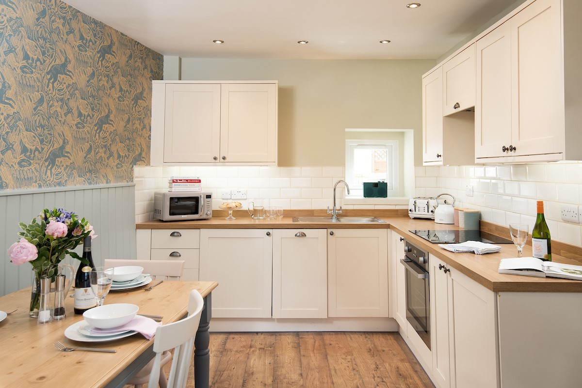 Campsie Cottage - the country-style kitchen is a welcoming space for cooking and dining together