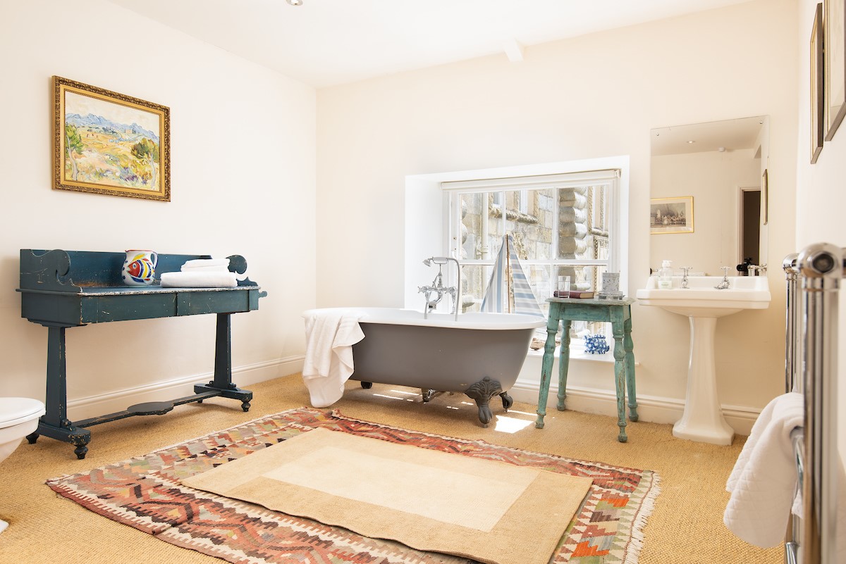 The West wing, Capheaton - spacious bathroom with a roll-top bath