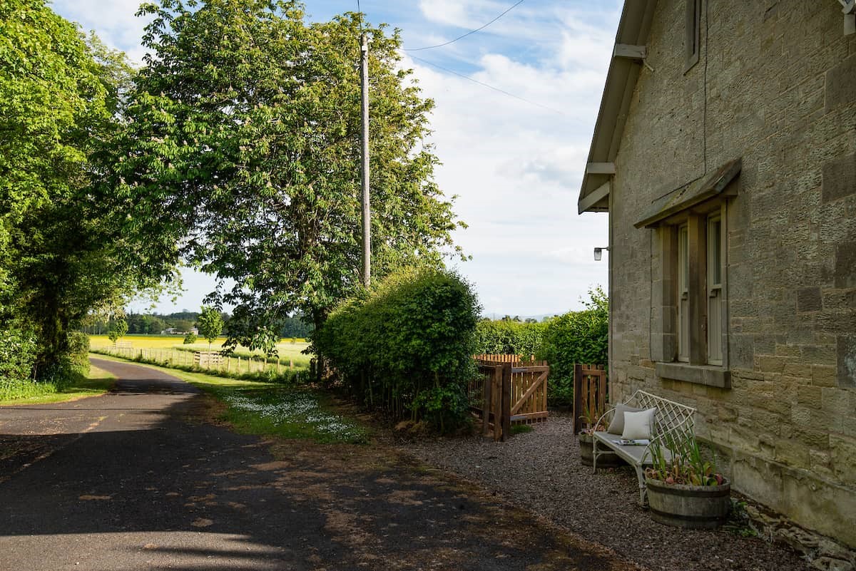 North Lodge - side aspect with private road leading into Milne Graden Estate