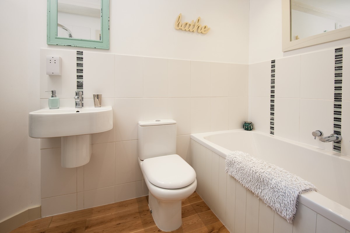 The Old Paper Mill - en-suite bathroom with bath, corner shower, WC and basin