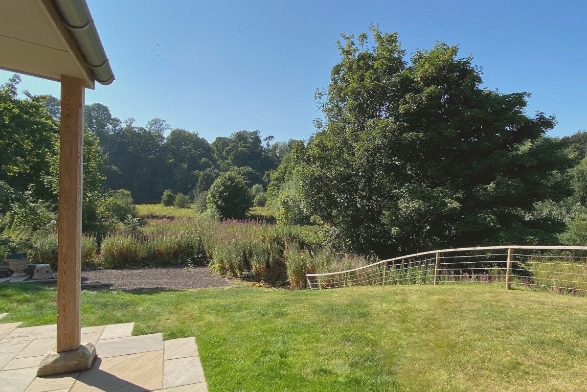 West Mill Cottage - dedicated parking space and lawned garden to the rear of the property