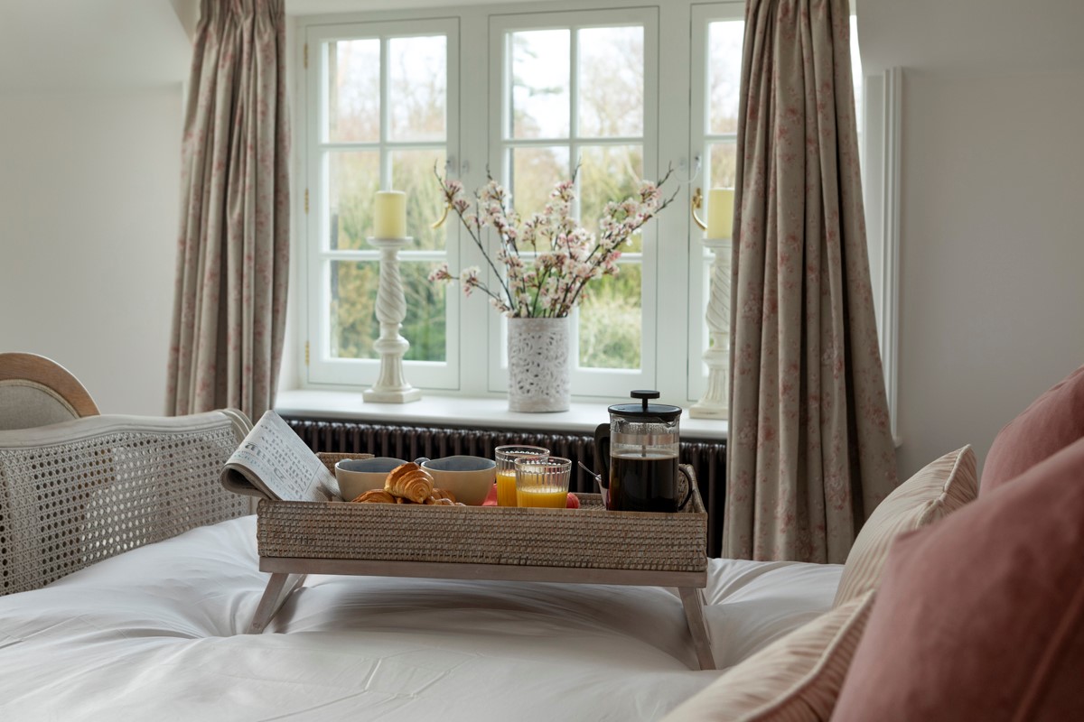 Gardener's Cottage, Twizell Estate - tuck into breakfast in bed while enjoying pretty garden views