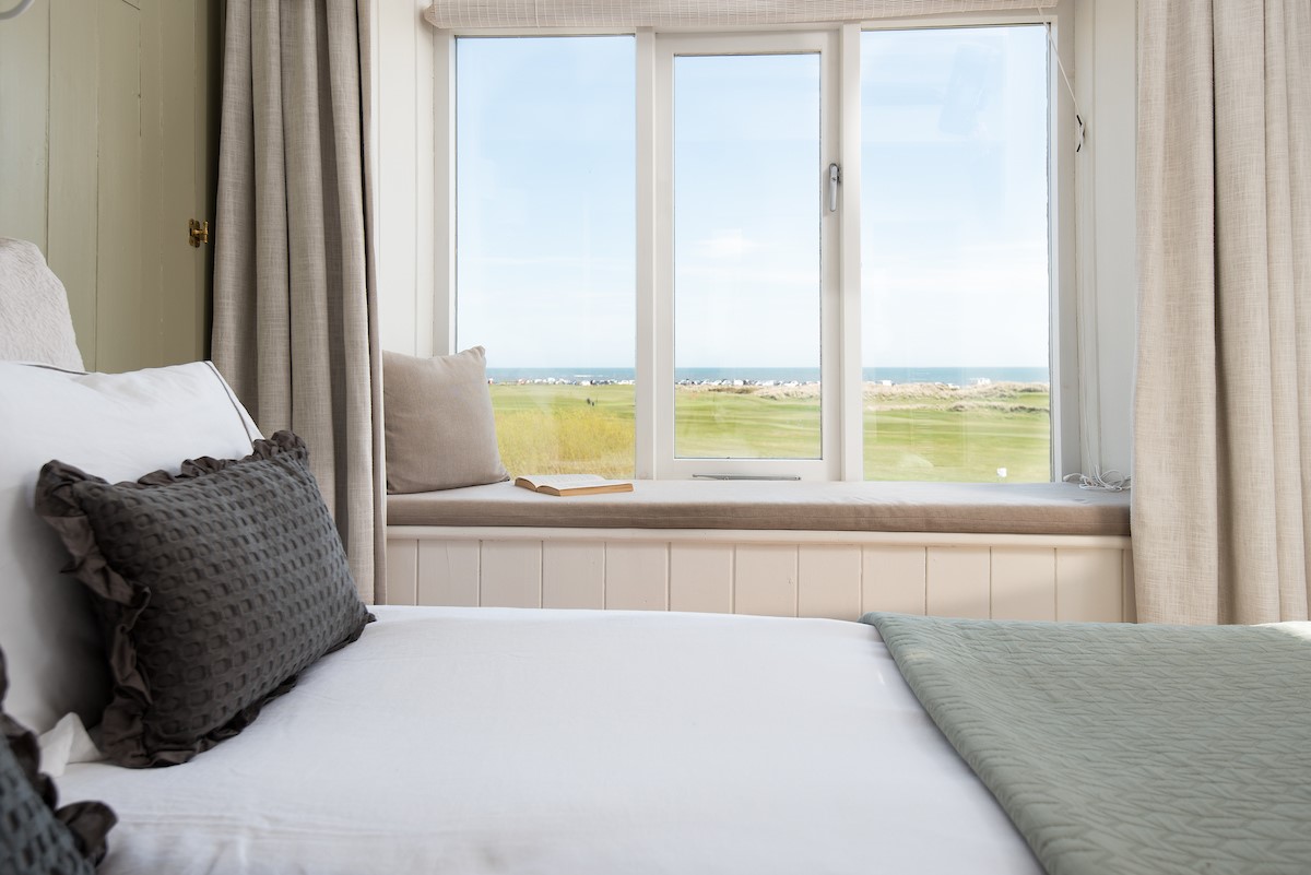 Marine House Cottage - sea views from the kingsize bed in bedroom one