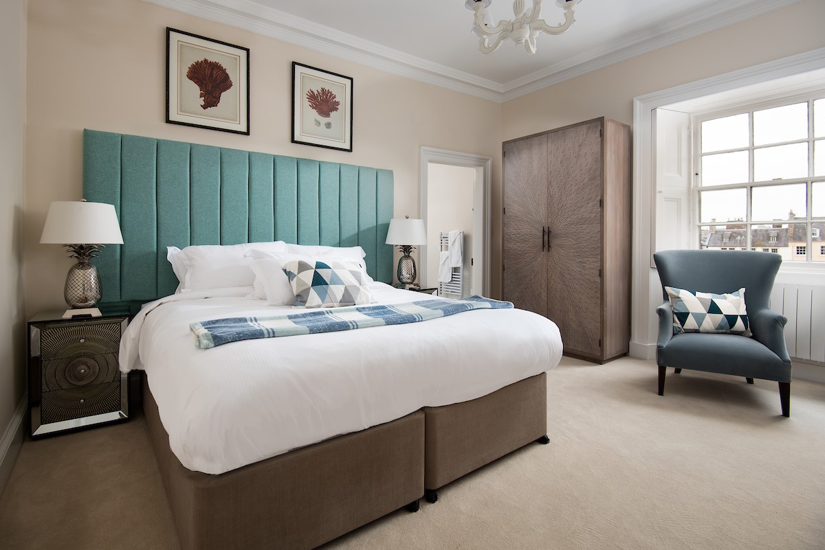 The Linen House - bedroom two with zip and link beds, which can be configured as a super king double or twin, as preferred