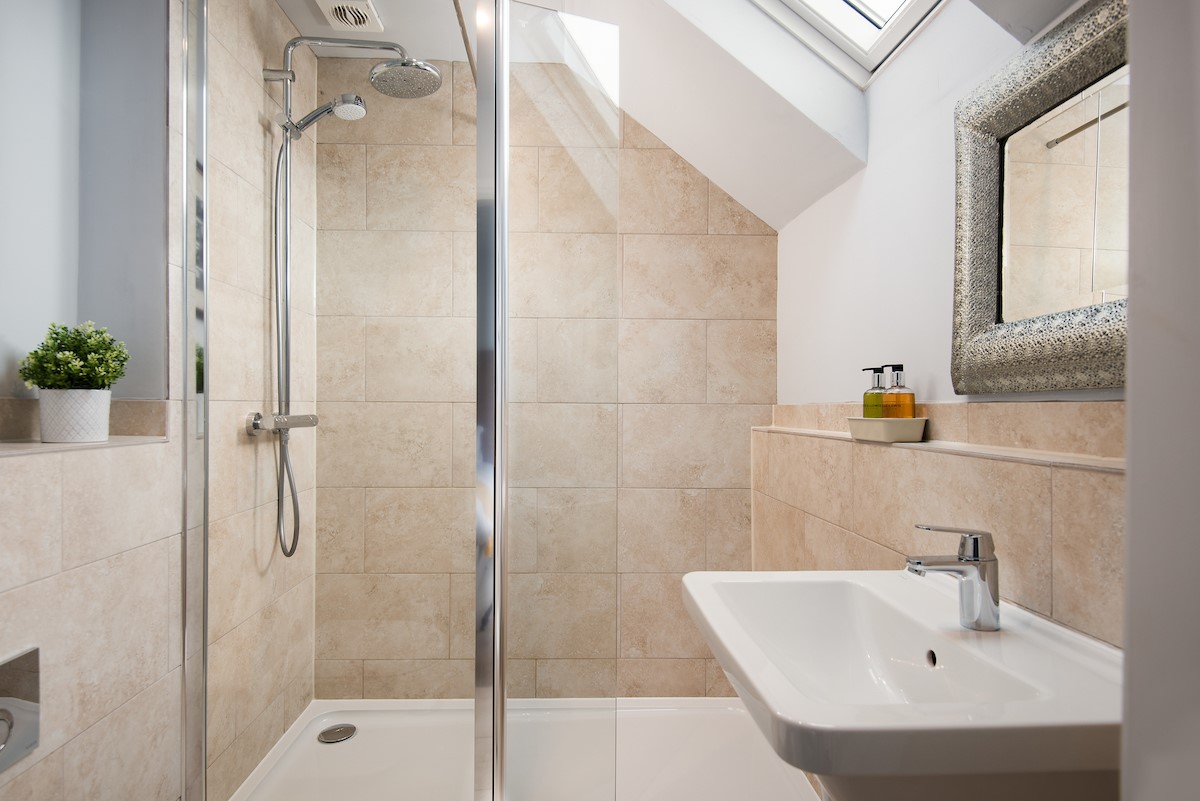 Cuthbert House - en-suite shower room with walk in shower, basin and WC