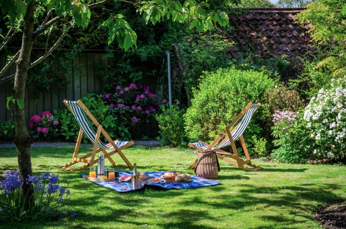 Rose Cottage, Huggate - relaxing in the garden in the summer