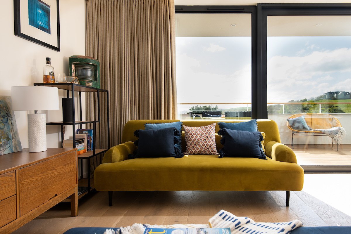 7 The Bay, Coldingham - the vibe at 7 The Bay is a celebration of colour and nature, with the full-height sliding doors ensuring a true sense of indoor/outdoor living