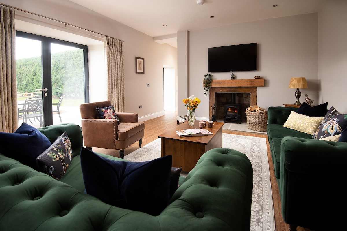 Granary View, Brockmill Farm - large French doors creates a bright space in the sitting room