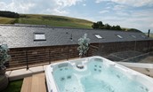 The Old Byre at West Moneylaws - take a relaxing soak in the hot tub while enjoying fabulous views