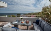 4 The Bay, Coldingham - outdoor corner sofa looking out towards Coldingham Bay - perfect for al fresco dining