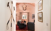 Lakeside Cottage - Edward - the sitting room is inviting with its warm colour scheme and exposed brickwork