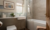 Greengate - family bathroom with bath and shower over, WC and basin