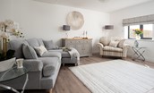 Sunwick Cottage - comfortable seating in the bright sitting room