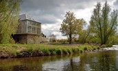 Heiton Mill House - view of the house from the river