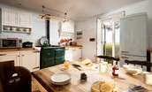 Castle View Cottage - the kitchen layout is perfect for relaxed chit-chat while rustling up a homemade meal