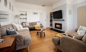 Driftwood Bamburgh - sitting room with Stovax Studio inset wood burner