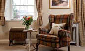 Saddler Cottage - tartan armchair