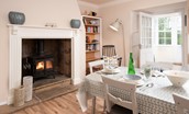Berryburn Cottage - wood burning stove in the kitchen dining area