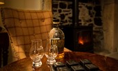Aydon Castle Cottage - enjoy a dram and a game of noughts and crosses by the fire