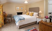 Aydon Castle Cottage - bedroom one with king size bed