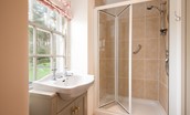 Broadgate House - bedroom two en-suite shower room with WC, basin and walk-in shower