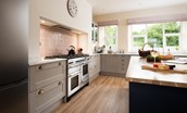 Wark Farmhouse - the kitchen with large Rangemaster cooker