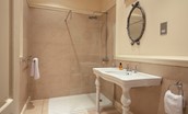 Eslington East Wing - bedroom five en-suite shower room containing walk-in shower with rainforest shower head