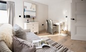 Seaside House - bedroom two with seating and dressing table