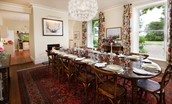 Brunton House - dining room with seating for 16 guests leading through to the kitchen