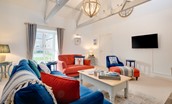 Samphire Barn - bright and spacious sitting room with plenty of comfortable seating