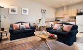 The Bothy at Cheswick - open-plan living area comprising a kitchen, dining area and comfortable sitting room