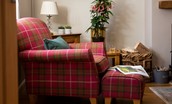 Royland Cottage - a relaxing chair in the lounge
