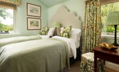 Rowchester West Lodge - bedroom two sits on the ground floor with dual aspect windows to appreciate the beautiful garden