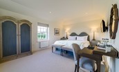 Fenton Lodge - South bedroom with zip and link beds, TV, wardrobe, side tables and dressing table