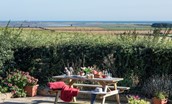April Cottage - the picnic table with views of the beautiful coastline
