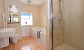 Hawthorn House - family bathroom with bath and separate shower with rainforest shower head