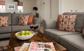 Farm Cottage - grey sofas and pretty contrasting detailing