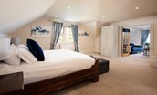 Bracken Lodge - bedroom three is a spacious with separate private sitting room through the double doors