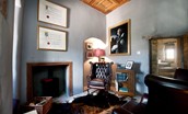 Aikwood Tower - Laird's Study with panelled ceiling and wood burning stove