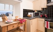 Budle Bay Loft - kitchen area with sea views