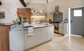 Coach House - the open-plan kitchen with double Range cooker and island