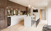 Coledale Stables - modern kitchen with island with stool seating for four guests