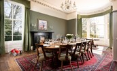 Cairnbank House - the light-filled dining room with ornate plasterwork and open fire is a wonderful spot for formal entertainment